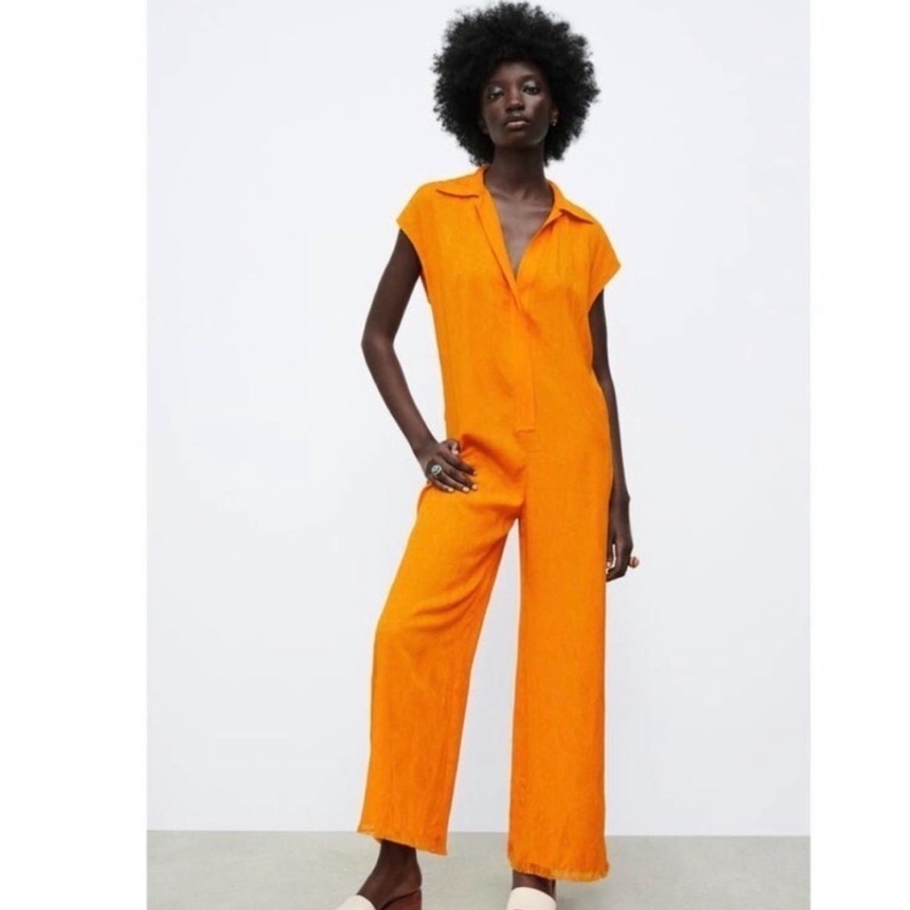 Vibrant Orange Sleeveless Jumpsuit with V-Neck and Wide-Leg Style
